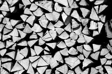 Firewood background. Black and white vintage style.
