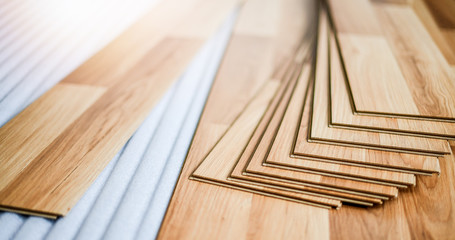 Timber laminate floor. Wooden floors boards top view. House interior room  renovation.