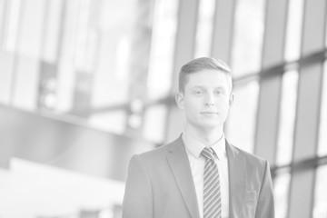 Black and white photo of  handsome confident businessman