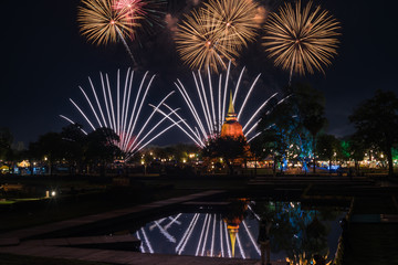 Firework of Loi Krathong festival showing in Sukhothai historical park. Sukhothai, Thailand.