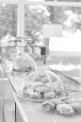 Black and white photo of pastries at restaurant