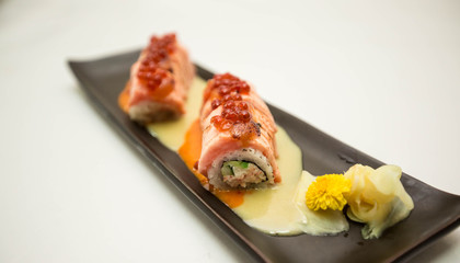 salmon roll with miso sauce and decorate with  Caviar