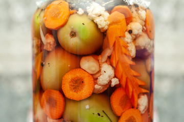 Various vegetables pickled in a jar
