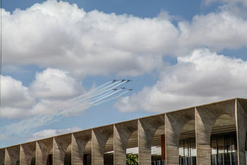 Fototapeta na wymiar Brasilia, October 29, 2019: FAB, Brazilian Air Force, Smoke Squadron, in the sky of the Brazilian capital, a stunt show and commemorative maneuvers of Brazil Independence Day - September 7