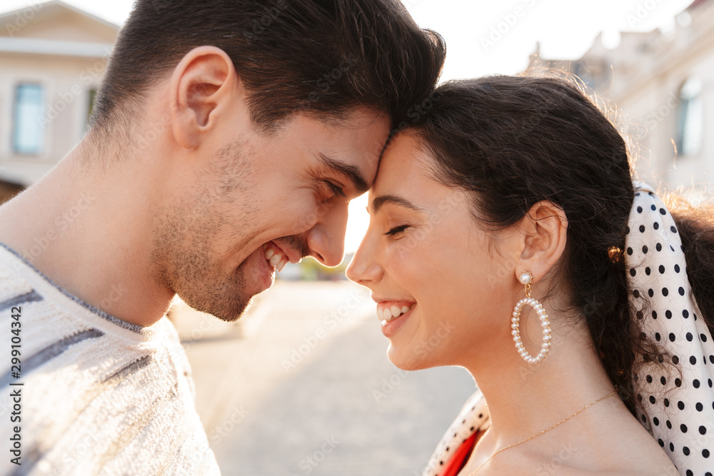 Canvas Prints image closeup of happy caucasian couple smiling head to head