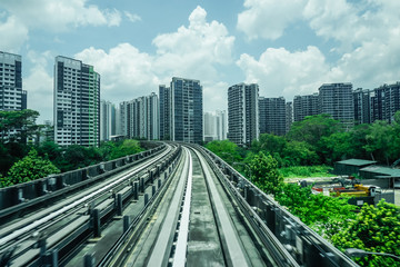 Fototapeta na wymiar Monorail rails on the background of Singapore skyscrapers