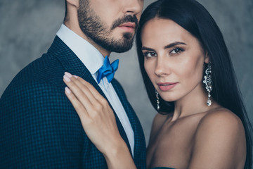 Cropped photo of chic couple in love standing close tenderness trendy naughty dreams finally alone together house wear luxury shiny trendy formalwear suit dress indoors
