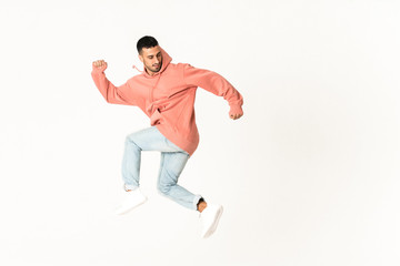 Man dancing street dance style over isolated white background