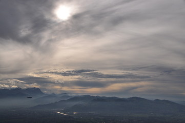 a zeppelin airship flying over the Alps seen from the Pfänder, Voralberg, Austria © Simo
