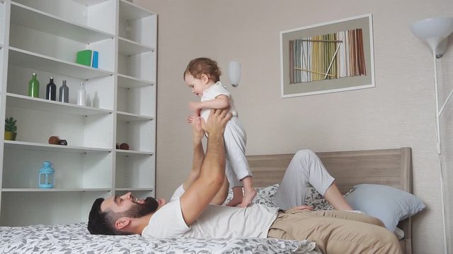 happy father enjoying spending tim with their daughter, happiness, positive feeling and emotion