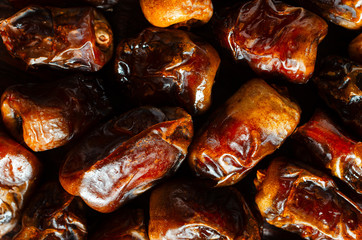 Background of dried dates. Healthy sweets, healthy nutrition.