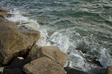 waves crashing on rocks