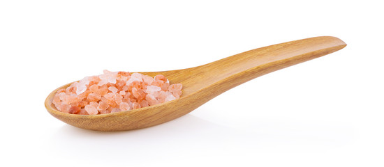 Himalayan salt raw crystals in wood spoon Isolated on white background
