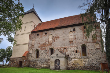 Fototapeta premium Teutonic castle from the end of the 14th century. In 1513, the stronghold was turned into a church. Bezławki, Poland.