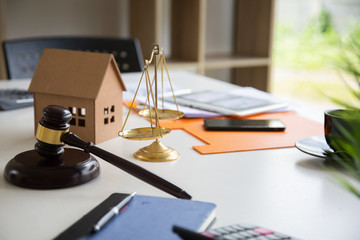 Justice law Scales and books and wooden gavel tool on desk in  Lawyer office.concept