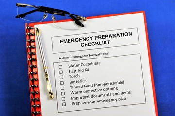 Emergency preparedness checklist.Emergency survival items.Water containers, first aid kit, torch,...