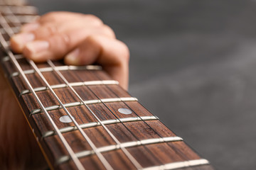Fototapeta premium Woman with modern acoustic guitar, closeup view
