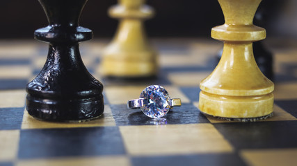chess pieces and silver decoration with stone
