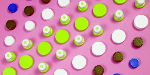 Many different types used or new battery, rechargeable accumulator, alkaline batteries on color background.