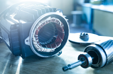 Close-up of iron industrial motor lies on a table