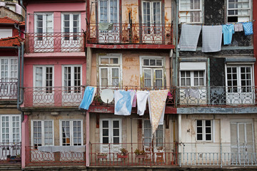 View of the facades of houses with balconies