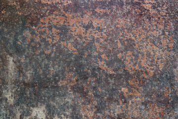 Old stone wall with black and orange texture