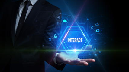 Man hand holding INTERACT inscription, social media concept