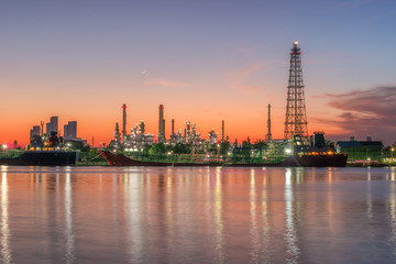 oil refinery industry plant along twilight morning