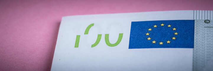 Euro cash on a lilac, purple and pink background. Euro Money Banknotes. Euro Money. Euro bill. Place for text.