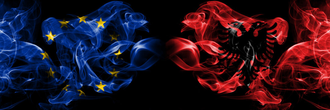 Eu, European union vs Albania, Albanian smoke flags placed side by side. Thick colored silky smokes abstract flags
