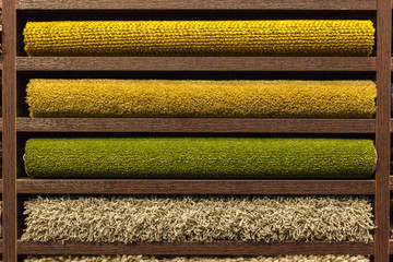 samples of multi-colored carpets on the shelves