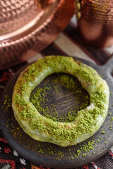 Traditional Turkish Pastry Dessert with Clotted Cream and Pistachios, Simit Katmer