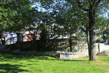 Public park area at the war memorial, downtown, St. John's, Newfoundland. Sunny summer day.