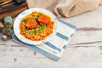 Stuffed tomatoes and rice with tomato