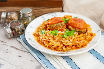 Stuffed tomatoes and rice with tomato