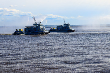 Extinguishing a burning ship during naval exercises