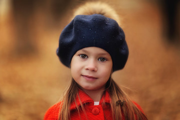 Outdoor autumn portrait of young girl