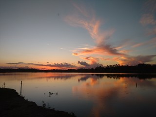 Naklejka na ściany i meble sunset over lake