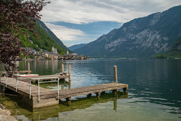 View on lake in austrian town hallstatt during tourist season in summer