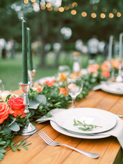 Table setting for an event party or wedding reception. Table settings for a luxury wedding. Outdoor wedding
