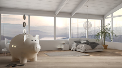 Wooden table top or shelf with white piggy bank with coins, modern panoramic bedroom with bathtub, expensive home interior design, renovation restructuring concept architecture