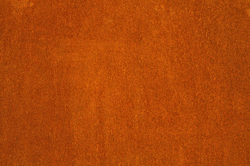 Rust and oxidized metal brown texture. Rusted orange grunge metal background