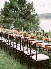 Table setting for an event party or wedding reception. Table settings for a luxury wedding. Outdoor wedding