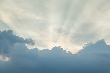 Evening sky and fluffy cloudy with beam of sun ray light . Using for nature wallpaper and background.