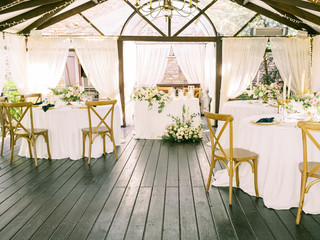 Table setting for an event party or wedding reception. Table settings for a luxury wedding. Outdoor wedding