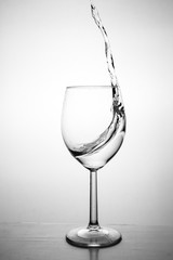 Glass with water up and splash