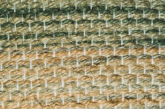 Fabric material macro. textile background. colorful rug close up