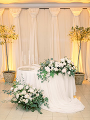 Table settings for a luxury wedding reception. Outdoor wedding