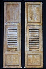Fototapeta na wymiar Light brown antique wooden doors
