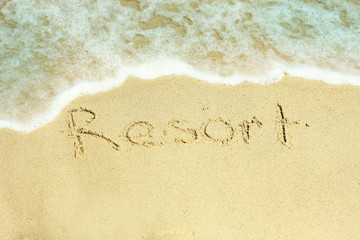 holiday inscription on the beach